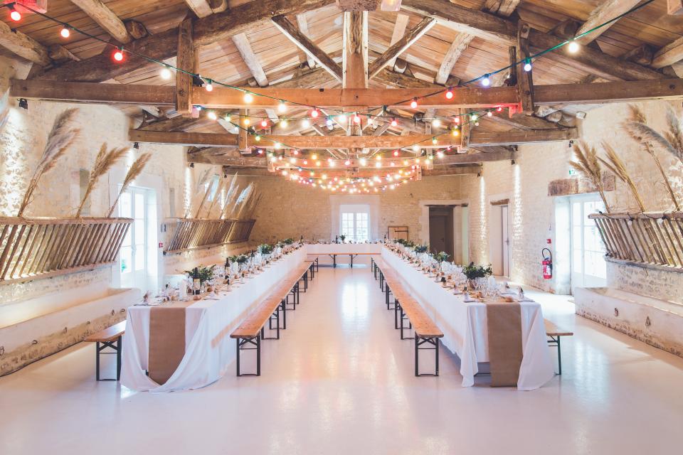 A long table set for a wedding dinner